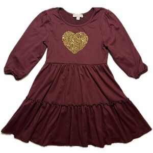 Heart dress is a maroon long-sleeve piece by “Social Academy” in size‎ 5